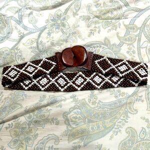 Wooden beaded belt.  Brown and white.  Wooden clasp.